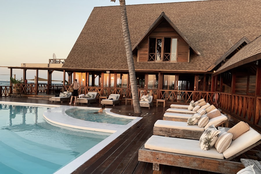 Luxury landscaped backyard with swimming pool at dusk